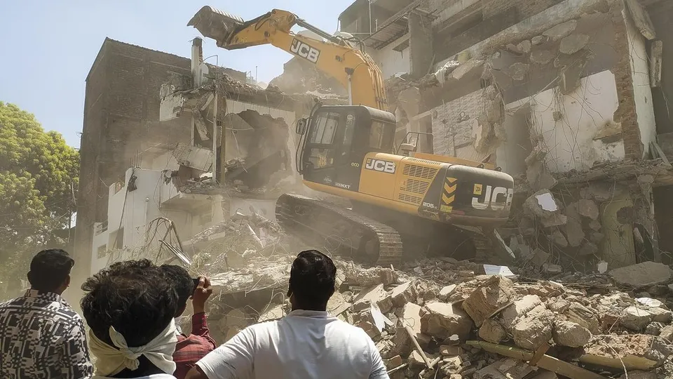 The house of Fahim Khan, alleged mastermind behind the Nagpur riots, being demolished, after he failed to remove an illegal structure within a 24-hour deadline in Nagpur on Monday, March 24, 2025.