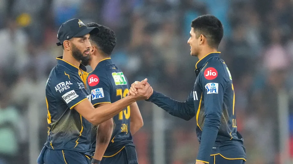 Gujarat Titans' captain Shubman Gill and Prasidh Krishna celebrate after winning IPL match against Mumbai Indians at the Narendra Modi Stadium in Ahmedabad on Saturday, March 29, 2025.