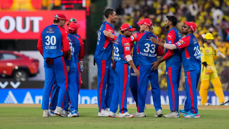 Delhi Capitals' Mitchell Starc celebrates with teammates after taking the wicket of Ruturaj Gaikwad during an IPL match against Chennai Super Kings at the MA Chidambaram Stadium in Chennai on Saturday, April 5, 2025.