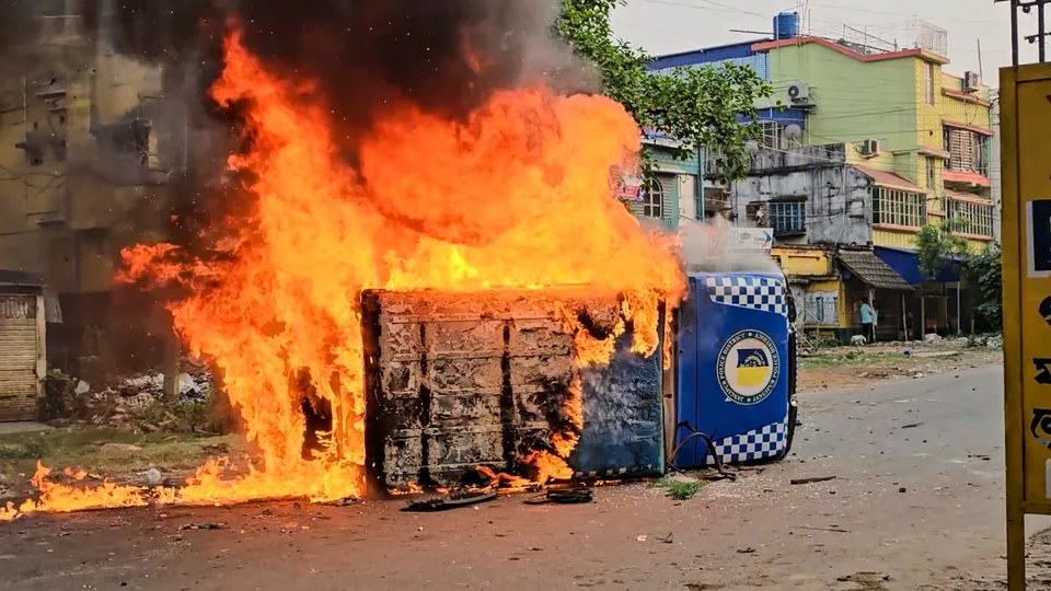 Muslim rioters torch and set ablaze a Police vehicle during a protest over the Waqf (Amendment) Act in Murshidabad district of West Bengal on Tuesday, April 8, 2025.
