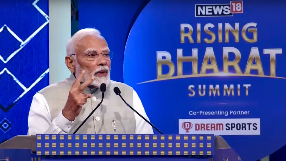 Narendra Modi addresses a gathering during Rising Bharat Summit in New Delhi on Tuesday, April 8, 2025.