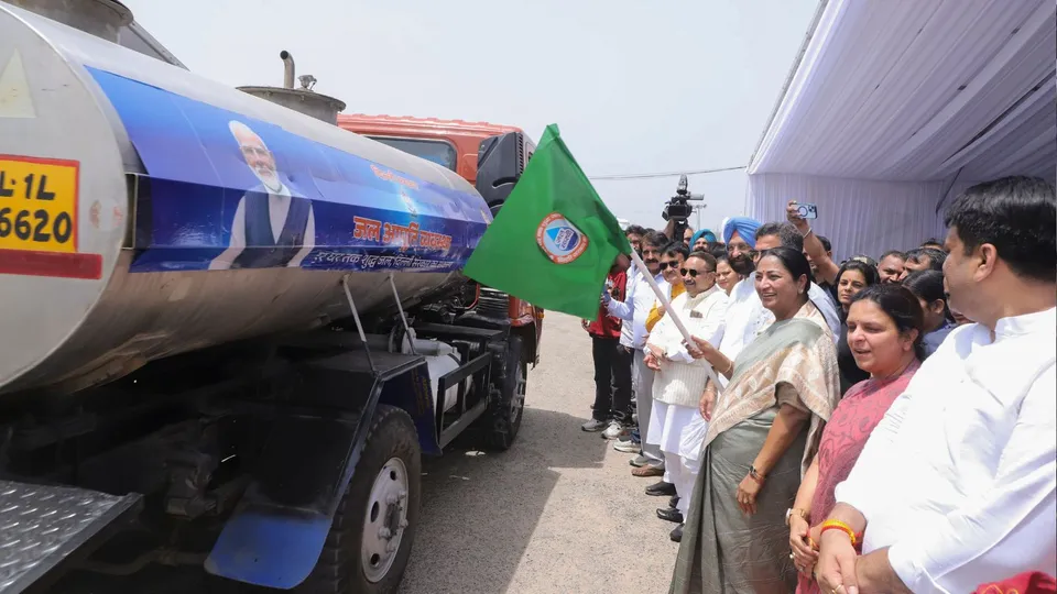 Delhi Chief Minister Rekha Gupta flags off 1,111 tankers fitted with a location tracking system to boost water supply in the city during summer, in New Delhi.
