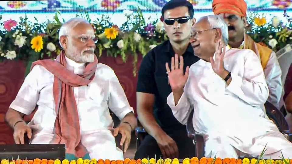 PM Modi with Bihar CM Nitish Kumar during the National Panchayati Raj Day programme, in Madhubani district, Bihar.