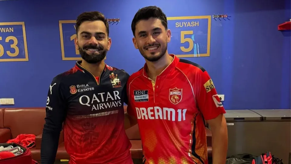 Nehal Wadhera with Virat Kohli
