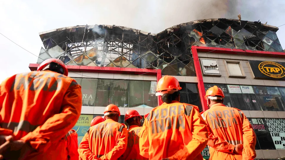 NDRF personnel during a rescue operation after a fire broke out at the Link Square Mall in the suburban Bandra area of Mumbai on Tuesday, April 29, 2025.