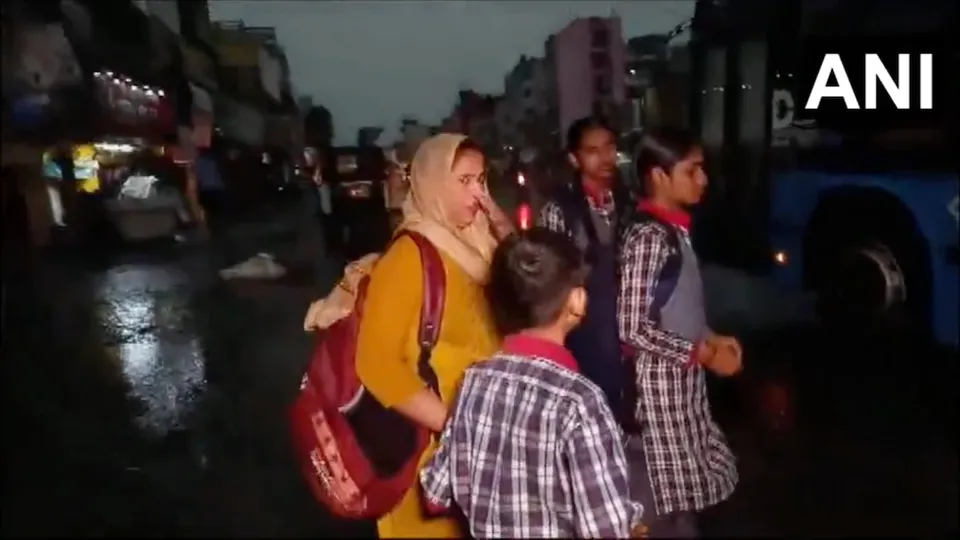 School children after early morning heavy rainfall, strong winds and lightning.