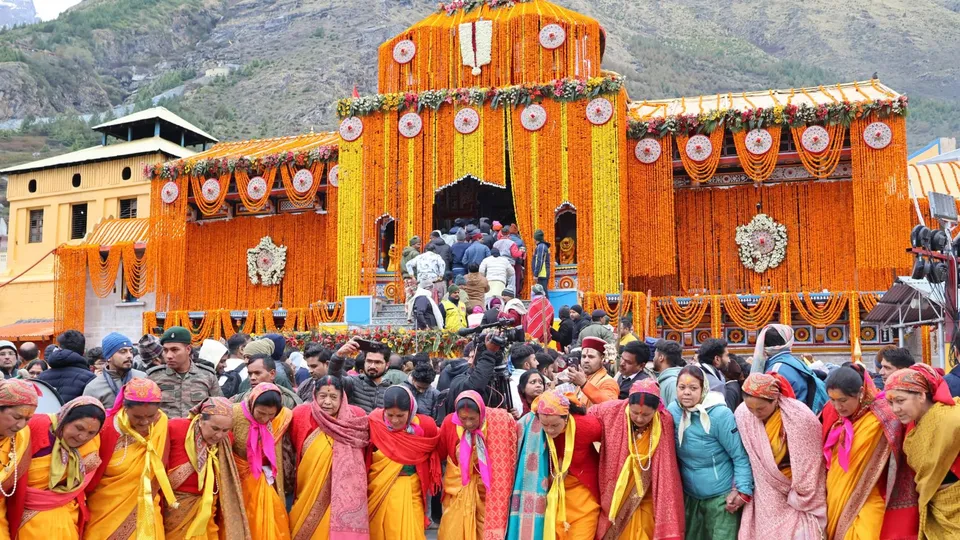 People visit the Shri Badrinath Dham as its doors opened, in Chamoli.