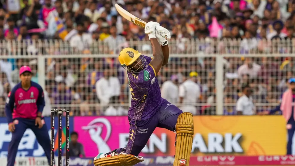 Andre Russell plays a shot during IPL 2025 T20 cricket match between KKR and RR, at the Eden Gardens, in Kolkata.
