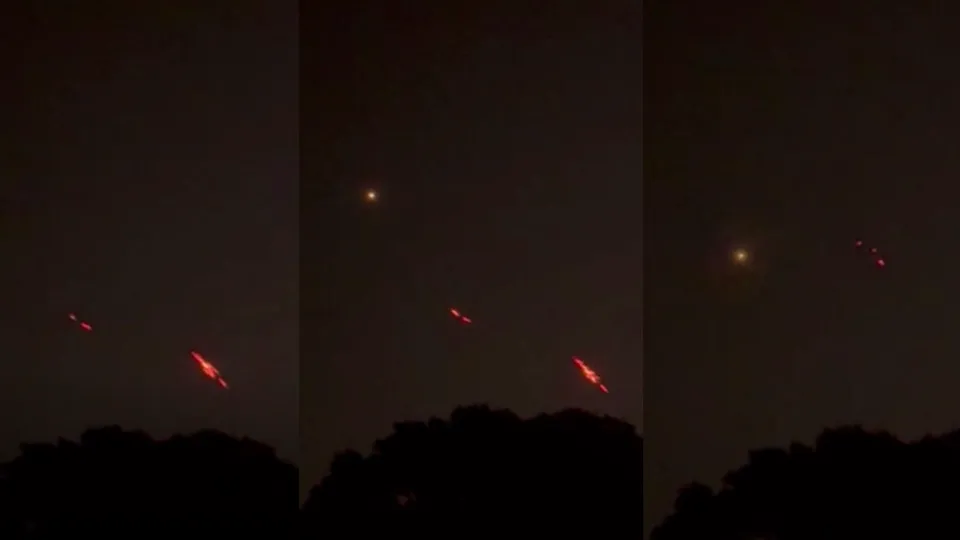 In this combo photo, red streaks seen as India's air defence intercepts suspected drones, near the International Border in Samba district on Monday, May 12, 2025.