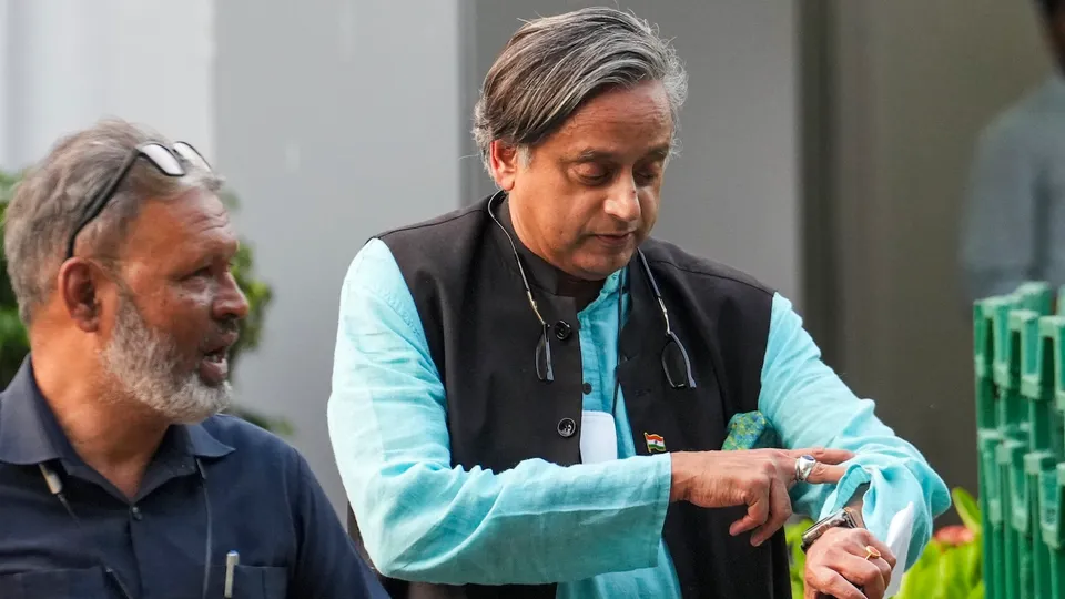 Shashi Tharoor leaves after a party meeting at the AICC office in New Delhi on Wednesday, May 14, 2025.