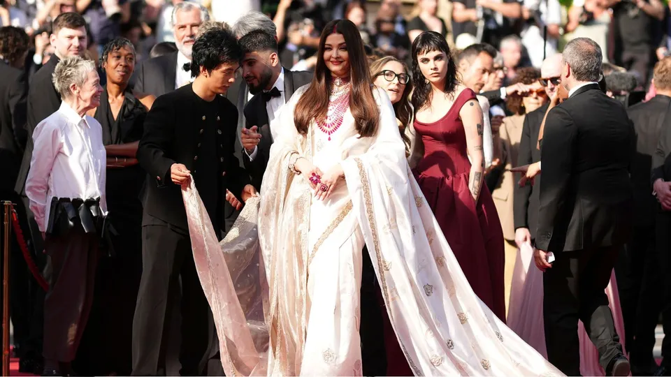 Aishwarya Rai Bachchan poses for photographers upon arrival at the premiere of the film 'The History of Sound' at the 78th international film festival, Cannes, southern France.