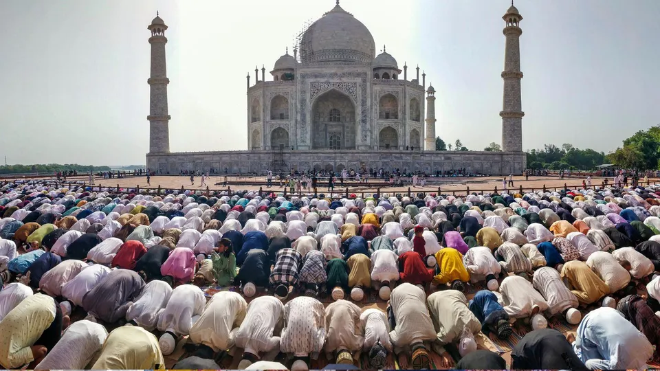 People offer namaz on the occasion of Eid-ul-Azha festival at Shahi Masjid inside the Taj Mahal complex, in Agra, Uttar Pradesh.