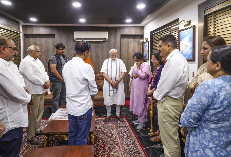 PM Narendra Modi meets family members of former Gujarat chief minister Vijay Rupani, who died Air India plane crash in Ahmedabad.