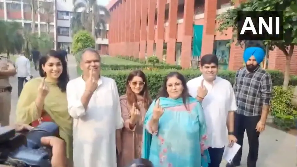 AAP candidate for Ludhiana West assembly by-polls, Sanjeev Arora, along with his family, casts his vote