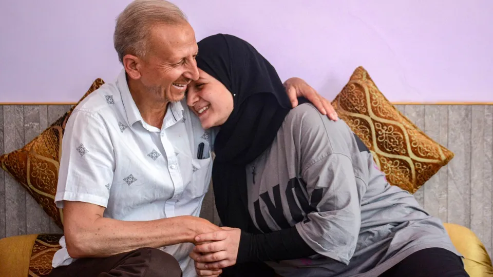 MBBS student Mehak Hussain with her father after returning home following her evacuation from Iran under Operation Sindhu, amid the Israel-Iran conflict, in Srinagar, Friday, June 20, 2025.
