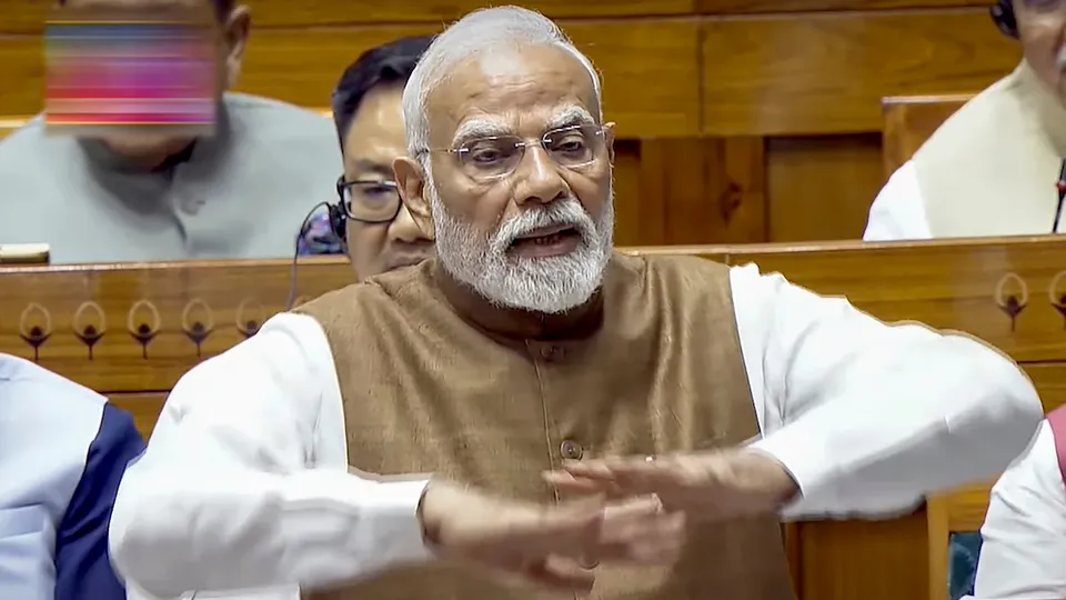 Narendra Modi speaks during a debate in the Lok Sabha on the Pahalgam terror attack and Operation Sindoor, at the Monsoon session of Parliament, in New Delhi, Tuesday, July 29, 2025.