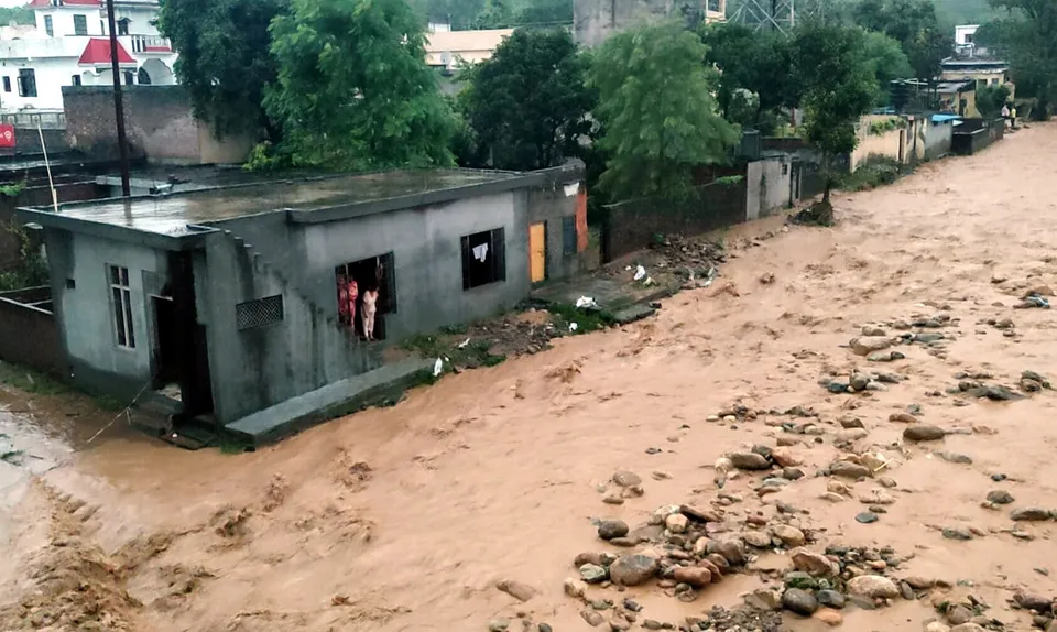 Debris and mud accumulated in a residential area following a cloudburst, in Kathua, Sunday, Aug. 17, 2025.