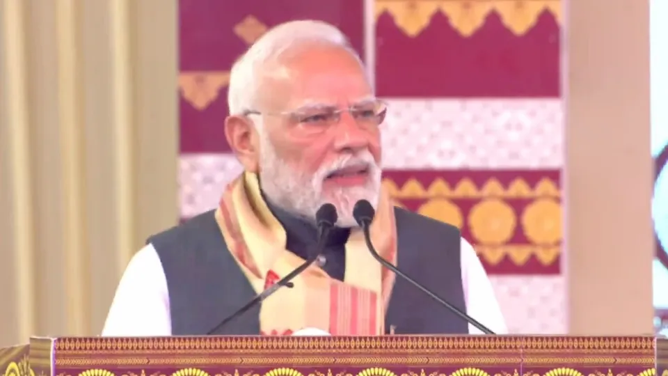 Narendra Modi speaking at a programme in Darrang, Assam on Sunday, Sept 14, 2025.