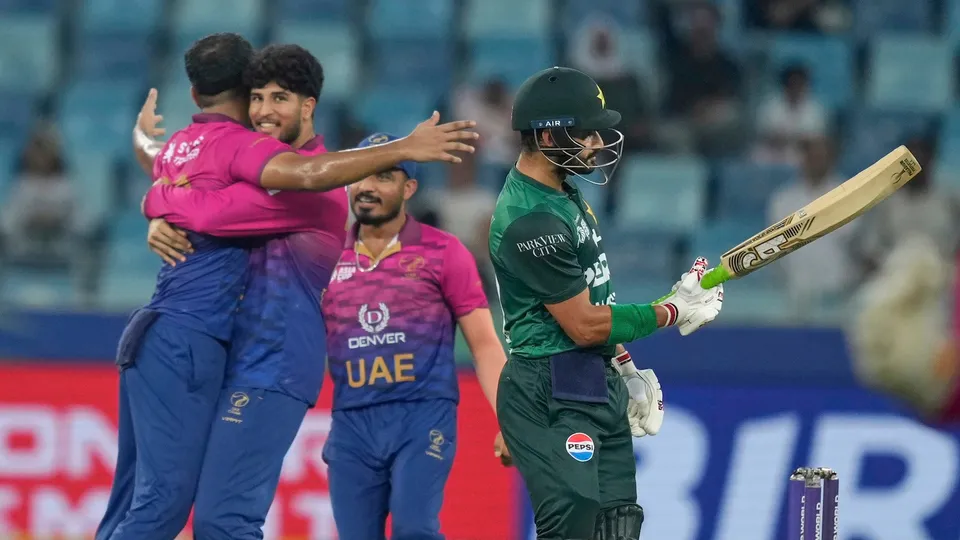 United Arab Emirates's Junaid Siddique, left, celebrates the dismissal of Pakistan's Sahibzada Farhan with teammates during the Asia Cup cricket match between Pakistan and United Arab Emirates at Dubai International Cricket Stadium, United Arab Emirates, Wednesday, Sept. 17, 2025. AP/PTI