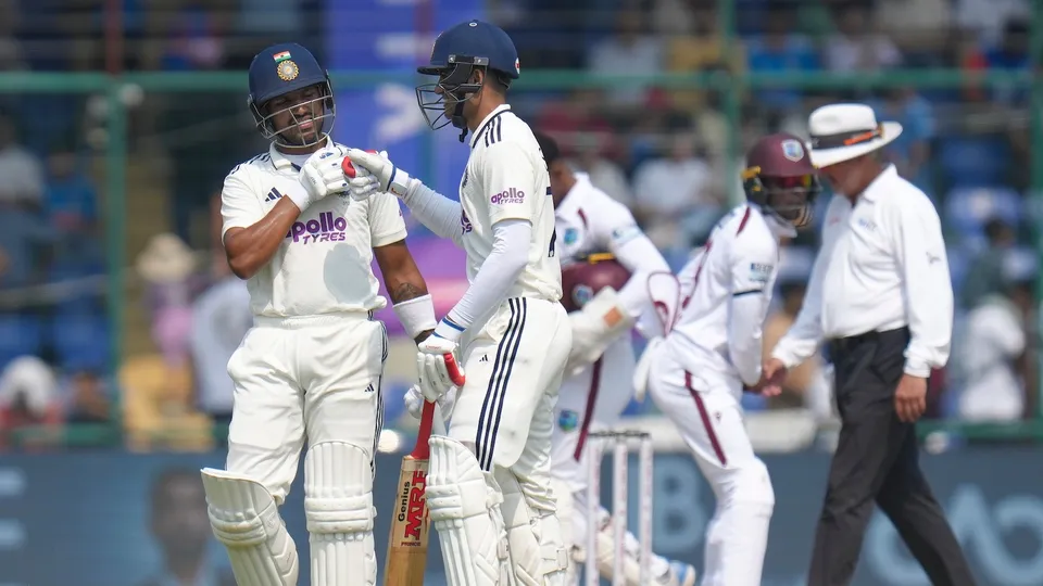 Shubman Gill, right, and Dhruv Jurel return to pavilion for Lunch on day two of the second and final Test cricket match of a series between India and West Indies, at the Arun Jaitley Stadium, in New Delhi, Saturday, Oct. 11, 2025.