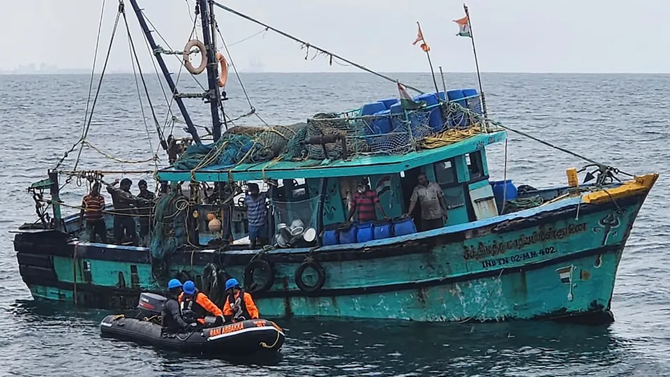 Indian Coast Guard personnel reach out to fishermen at sea, asking them to return to the shores amid possibility of a cyclone developing over southeast Bay of Bengal on Oct 24, 2025.