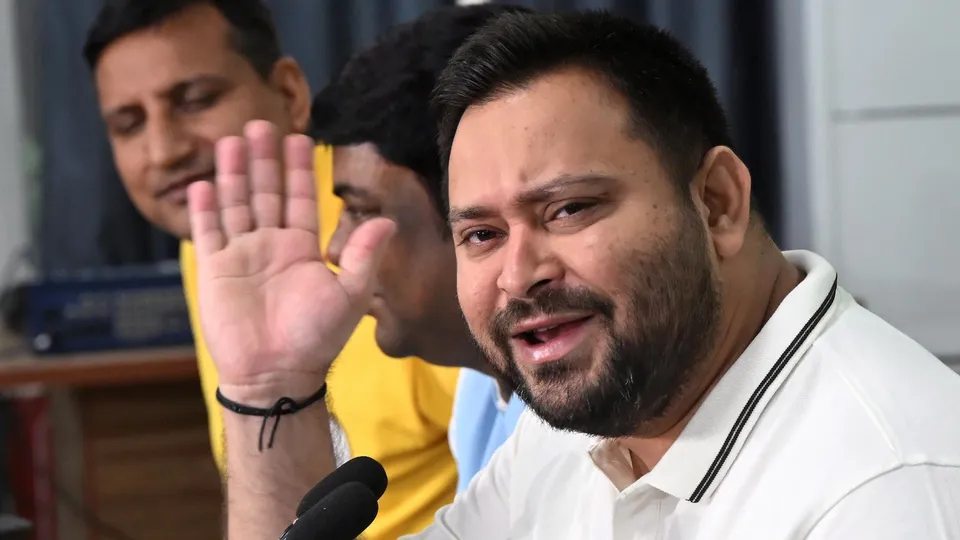 RJD Leader of Opposition Tejashwi Yadav addresses a press conference at his official residence, in Patna, Sunday, Oct. 26, 2025.
