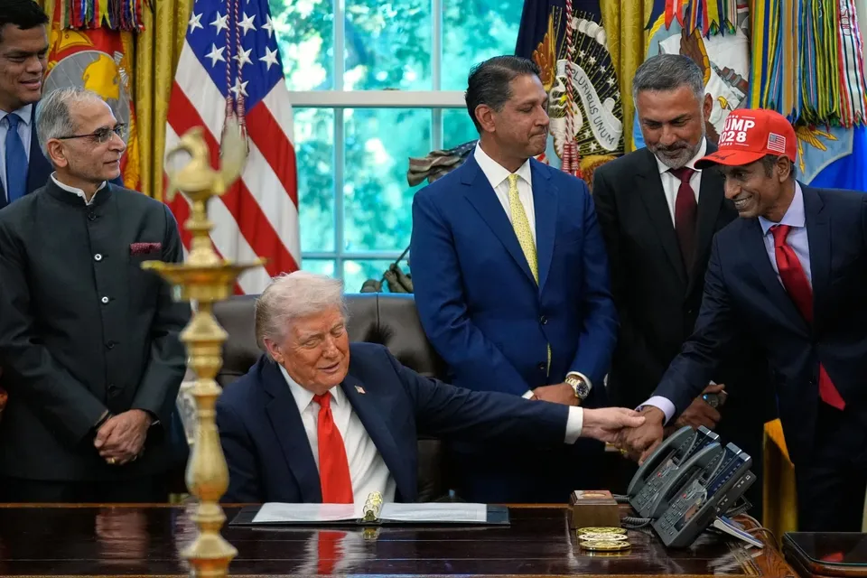 Donald Trump greets Timmy Cheedala during Diwali Celebrations at the White House on October 21, 2025.