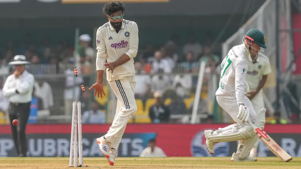 Ravindra Jadeja bowls during the day two of the second Test cricket match of a series between India and South Africa, at ACA Stadium in Guwahati, Sunday, Nov. 23, 2025.