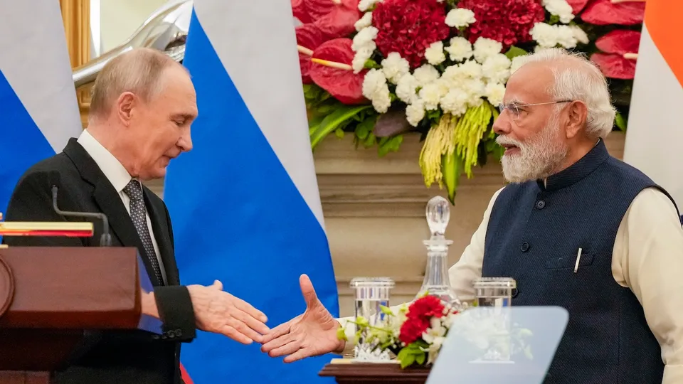 Prime Minister Narendra Modi with Russian President Vladimir Putin during a joint press statement after their meeting at the Hyderabad House, in New Delhi, Friday, Dec. 5, 2025.