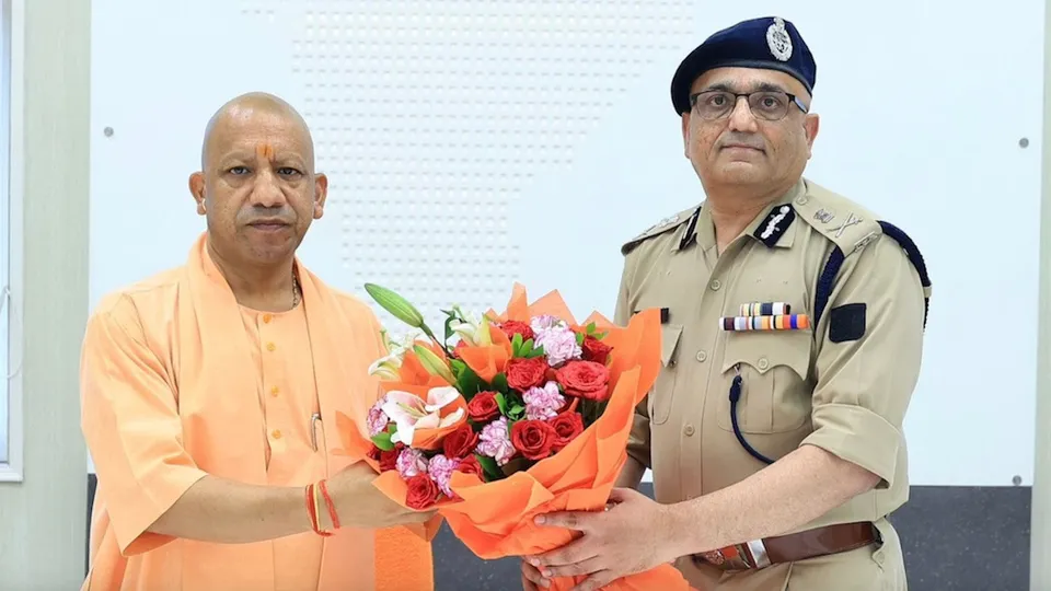 Yogi Adityanath with IPS officer Anand Swaroop
