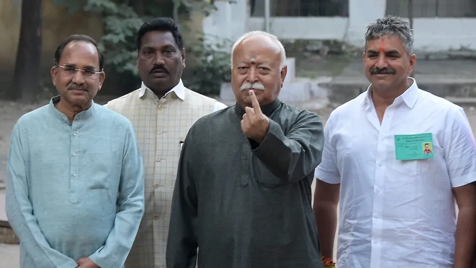 Mohan Bhagwat shows his ink marked finger after casting vote at a polling station during the Nagpur Municipal Corporation (NMC) elections, in Nagpur, Maharashtra, Thursday, Jan. 15, 2026.