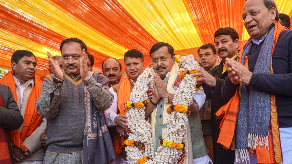BJP National Working President Nitin Nabin, party Delhi President Virendraa Sachdeva, party MP Manoj Tiwari, and others during a programme on the 'Makar Sankranti' festival, in New Delhi, Wednesday, Jan. 14, 2026.