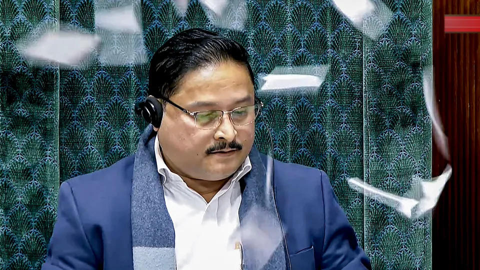 Congress MPs throw papers at the chair as BJP MP Dilip Saikia presides over the Lok Sabha during the Budget session of Parliament, in New Delhi, Tuesday, Feb. 3, 2026.