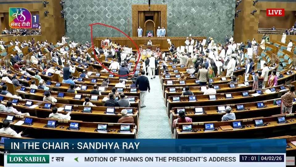 Women MPs from Opposition parties cross over to the treasury benches in Lok Sabha during the February 4, 2026 proceedings