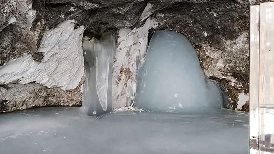 Naturally formed Shiv Lingam (ice-lingam) in the holy cave shrine of Amarnath, the abode of Lord Shiva, J & K