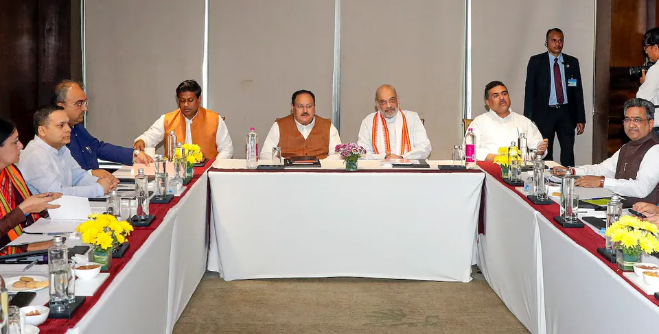 Amit Shah with BJP National President JP Nadda, West Bengal BJP President Sukanta Majumdar and others during a party meeting, in Kolkata, Tuesday, Dec. 26, 2023.
