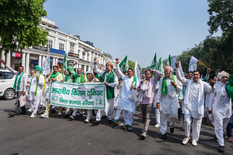 Bharatiya Kisan Union (BKU) workers take out a march towards Jantar Mantar in support of wrestlers protesting