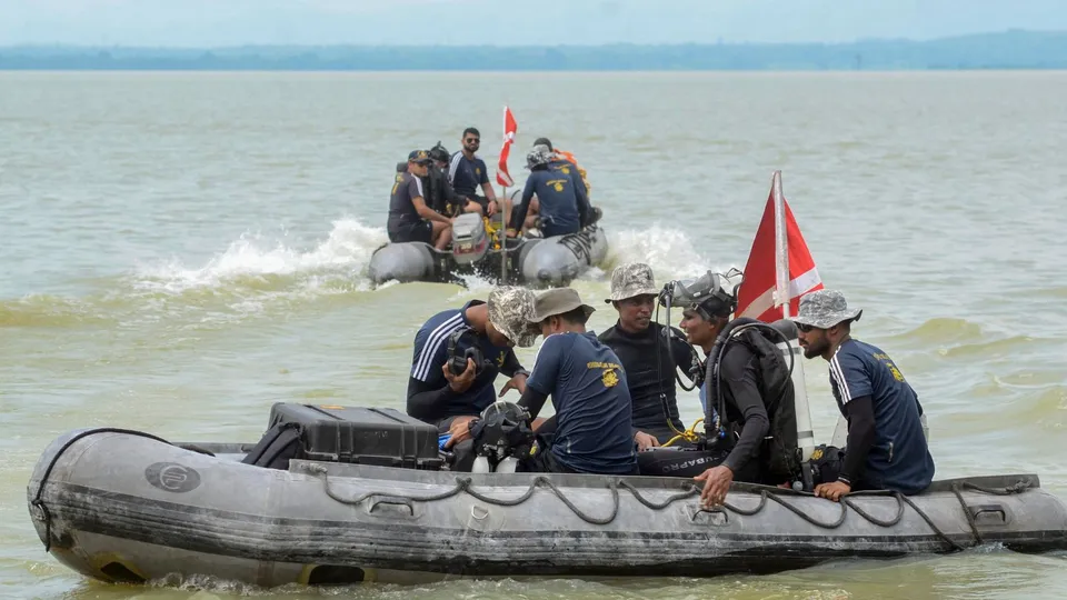 Indian Navy personnel conduct a search operation to trace missing trainer aircraft and both pilots near the Chandil Dam in Seraikela-Kharswan district, Thursday, Aug. 22, 2024.