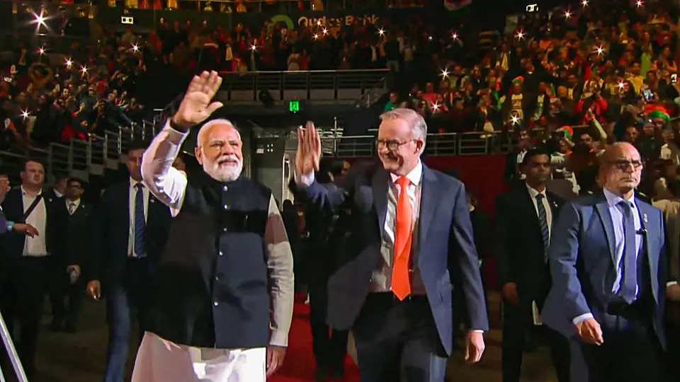 Prime Minister Narendra Modi with his Australian counterpart Anthony Albanese arrives to attend an Indian community programme, in Sydney