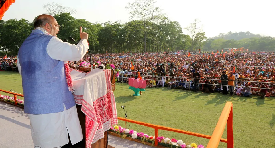 Home minister Amit Shah addressing a public rally at Brahmaputra River bank Sualkuchi, Kampur