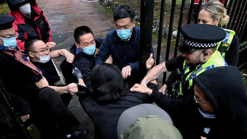 Hong Kong protester manhandled at Chinese consulate in UK
