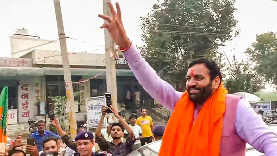 BJP candidate and Haryana Chief Minister Nayab Singh Saini celebrates with supporters after his victory from Ladwa constituency in the Haryana Assembly elections, on Tuesday, Oct. 8, 2024.