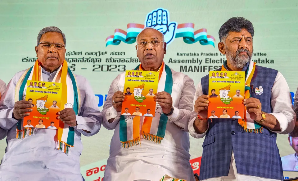 Congress President Mallikarjun Kharge with Karnataka Congress President DK Shivakumar and senior party leader Siddaramaiah releases the party's manifesto for the upcoming Karnataka Assembly elections