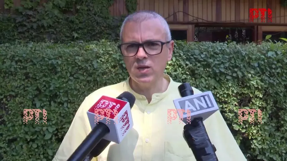National Conference leader Omar Abdullah talking to reporters