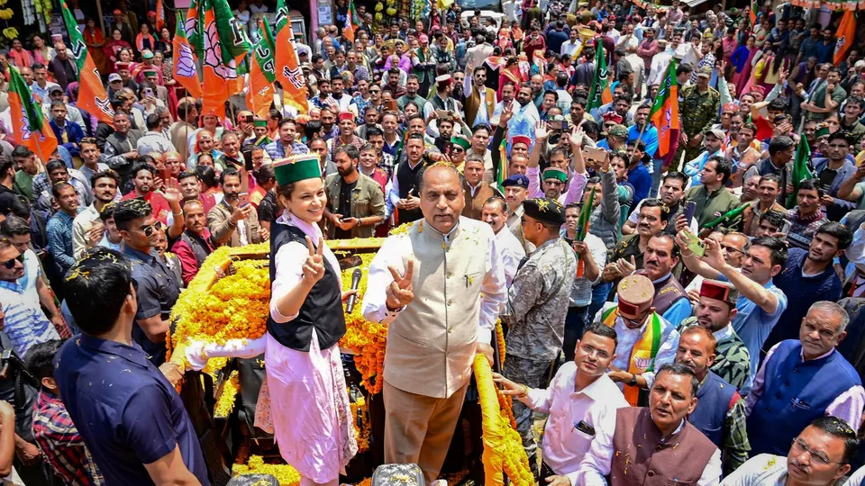 Former Himachal Pradesh CM Jairam Thakur with BJP candidate Kangana Ranaut during a rally for Lok Sabha elections, at Thunag in Mandi district, Monday, May 6, 2024