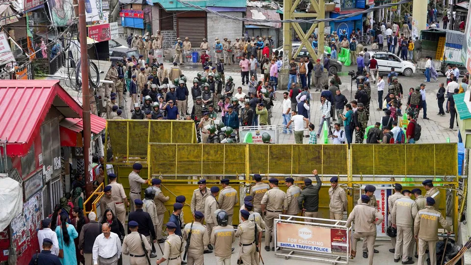 Security personnel keep vigil after prohibitory orders were imposed in the Sanjauli locality following escalating tension over illegal construction in a mosque