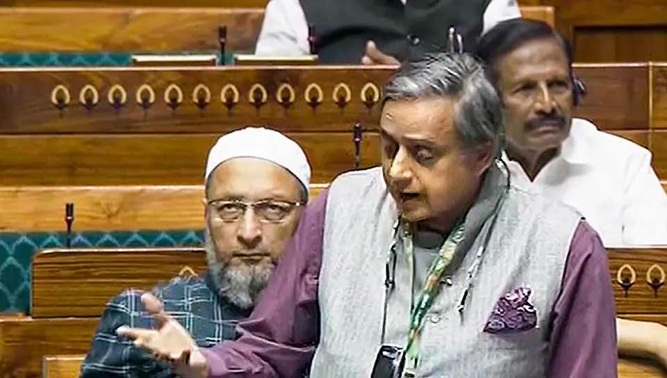 Congress MP Shashi Tharoor speaks in the Lok Sabha during the Winter session of Parliament, in New Delhi