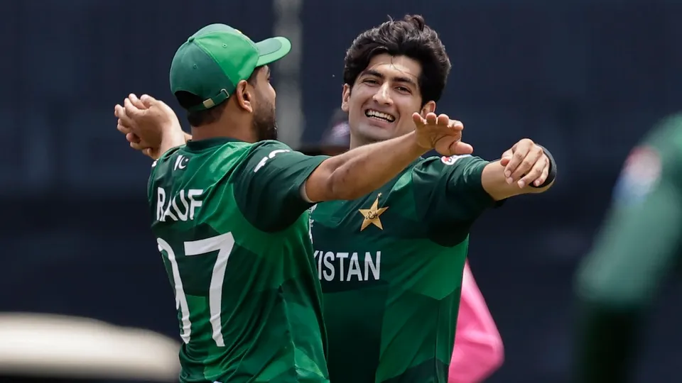 Pakistan's Naseem Shah, right, celebrates with teammate Haris Rauf after the dismissal of India's Shivam Dube during the ICC Men's T20 World Cup cricket match between India and Pakistan at the Nassau County International Cricket Stadium in Westbury, New York, Sunday, June 9, 2024.