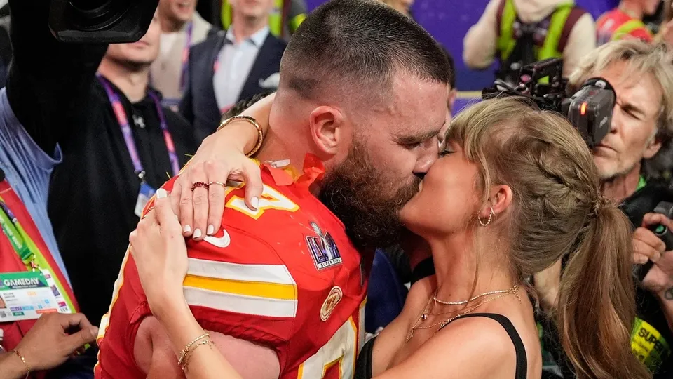 Taylor Swift almost in tears as she kisses boyfriend Travis Kelce
