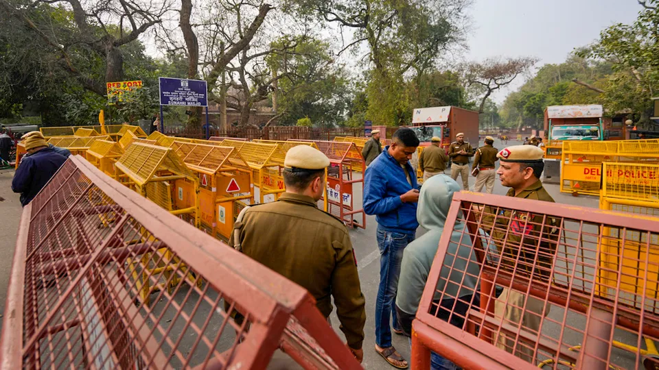Police personnel on alert at Red Fort in the view of farmers's Delhi Chalo march, in Delhi